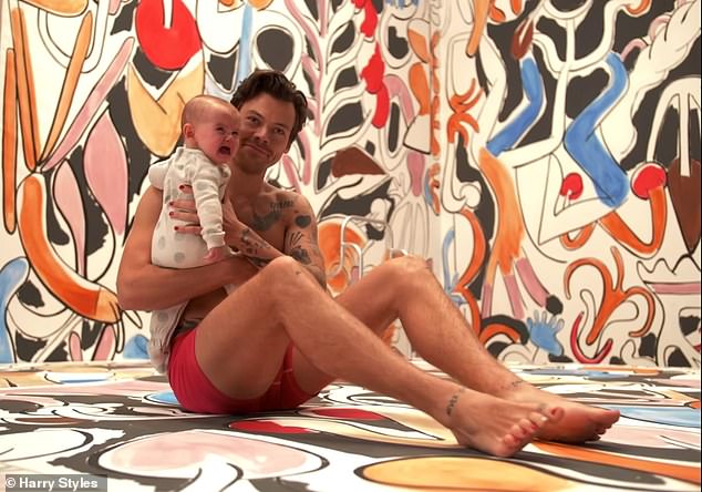 Shirtless Harry Styles cuddles baby in adorable behind-the-scenes clip from As It Was music video