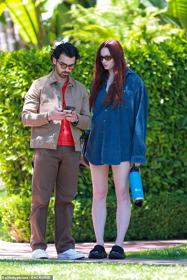 Pregnant Sophie Turner puts on a leggy display in a shirt as she steps out with husband Joe Jonas