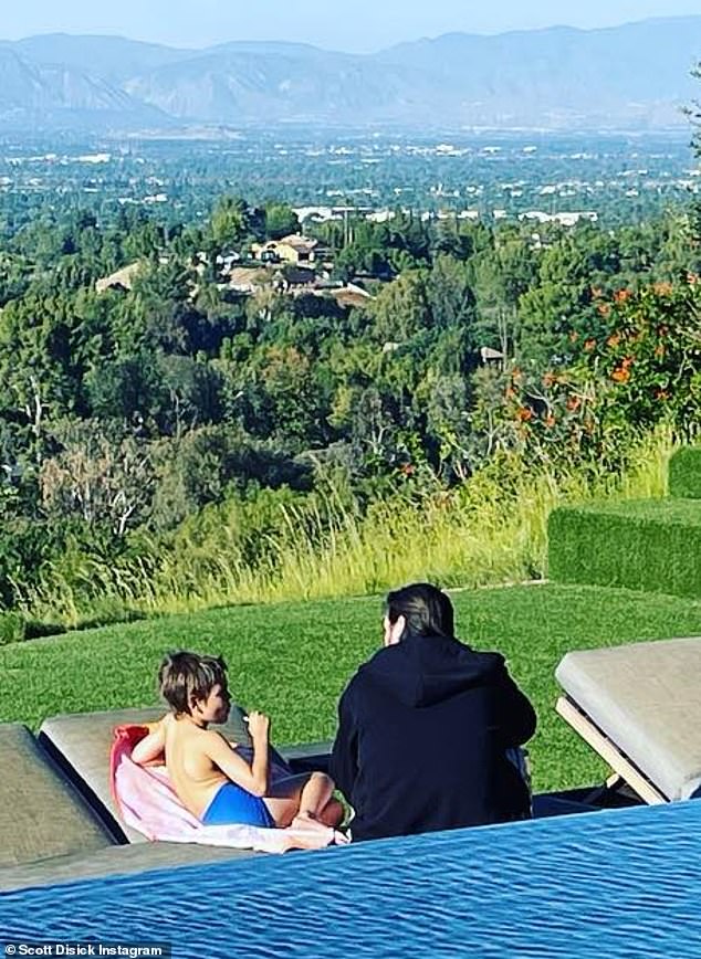 Scott Disick enjoys a pool day with kids as his ex Kourtney Kardashian marries Travis Barker