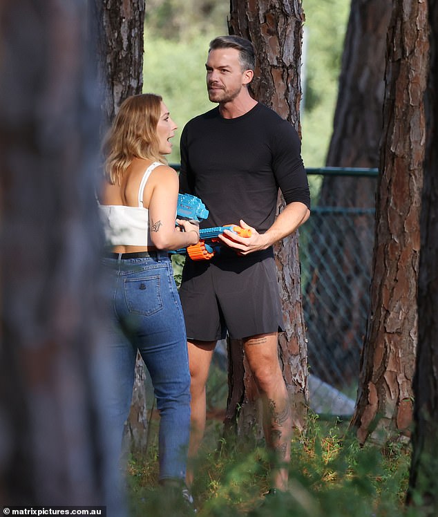 New Bachelor hunk Thomas Malucelli is spotted filming a very playful date on the Gold Coast