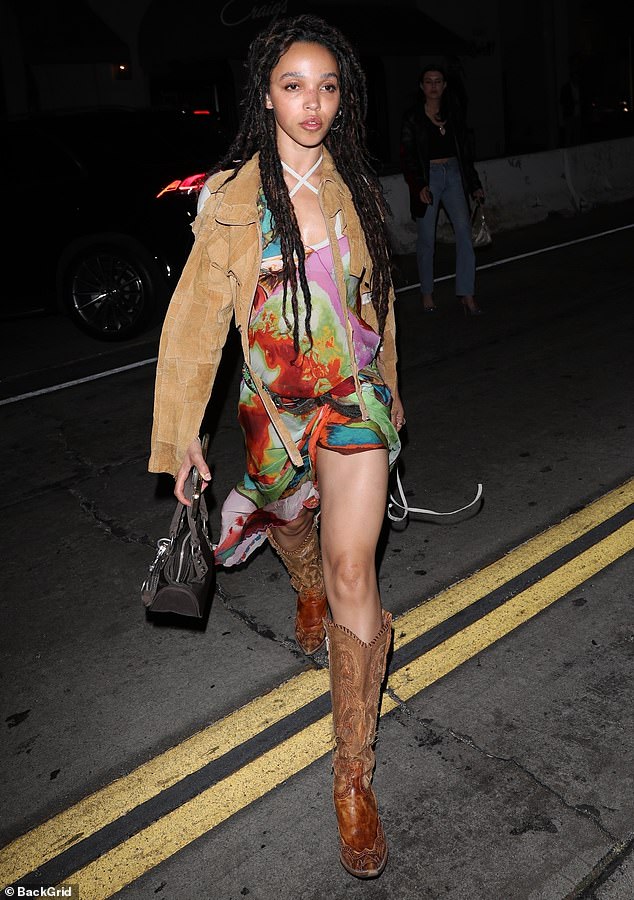 FKA twigs flashes her toned legs in a colorful dress as she leaves dinner with a mystery man