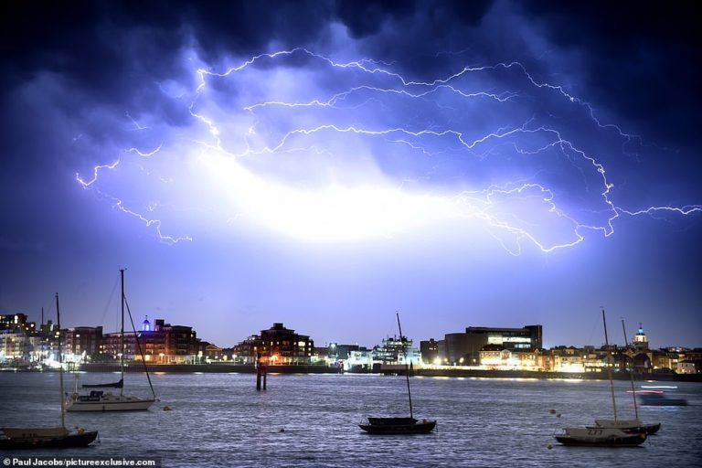 A flashy display: Violent thunderstorms signal a dramatic end to the mini-heatwave