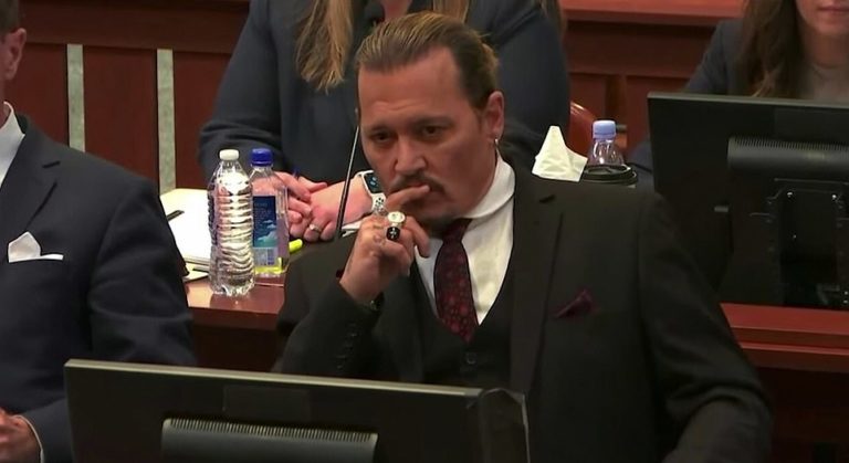 Johnny Depp looks Amber Heard’s sister Whitney straight in the eyes as she takes to the stand