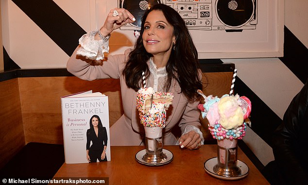 Bethenny Frankel takes milkshake break in pink peplum outfit while promoting new book in New York