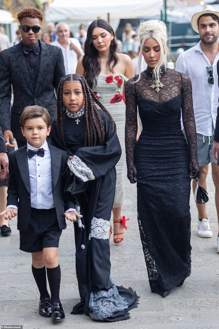 Kim Kardashian wows in gothic lace dress at sister Kourtney’s wedding