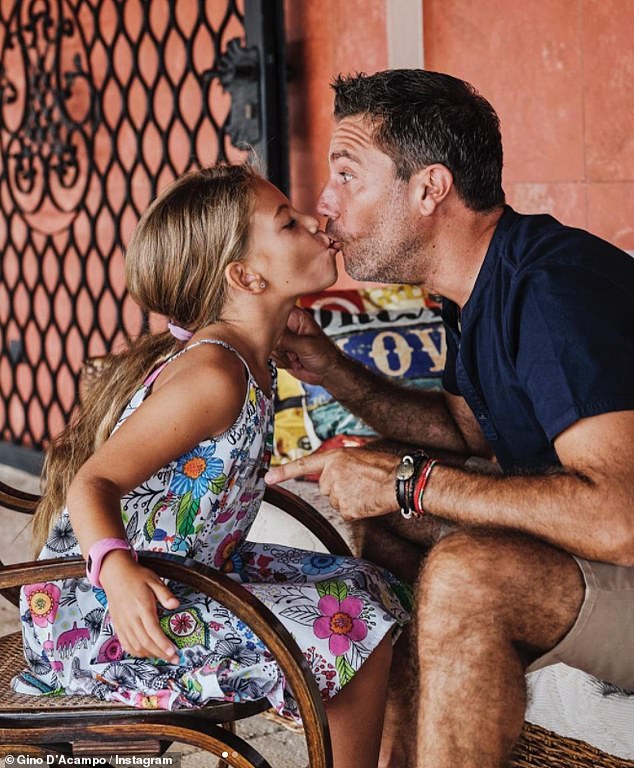Gino D’Acampo hits out at ‘haters’ and shares snap of himself giving daughter, 8, kiss on the lips