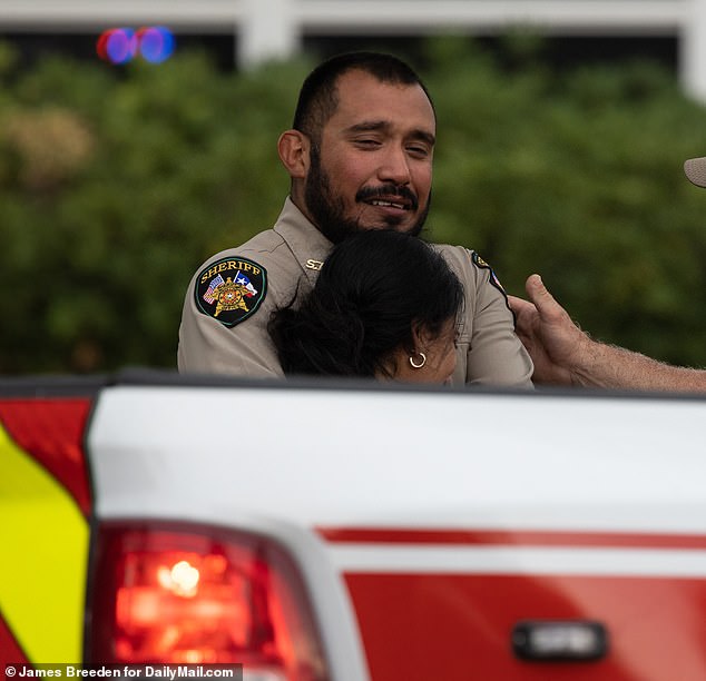 Distraught sheriff’s deputy weeps over death of daughter, 10, in Texas school massacre
