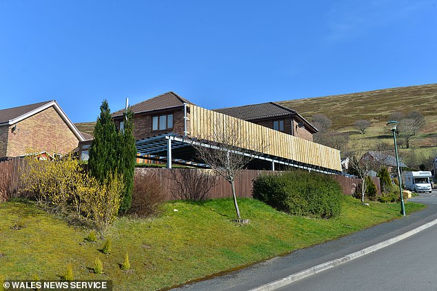 Britain’s ugliest decking, 44ft in length and 16ft tall, must be torn down after family loses appeal