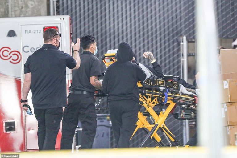 PICTURED: Travis Barker hospitalized in LA with wife Kourtney Kardashian at his side