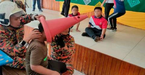 Boy’s head stuck in a traffic cone for thirty minutes
